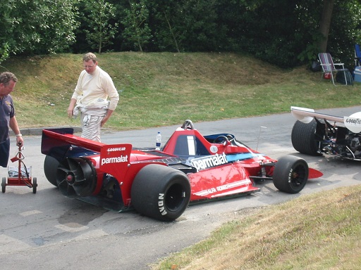 Brabham BT46B Fan Car with visible rear-mounted fan, shown squatting under acceleration during throttle application, demonstrating its unique downforce system. A car once described by Mario Andretti as “a bloody great vacuum cleaner.”