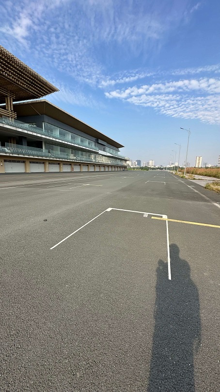 Hanoi Grand Prix track remnants with unused road and closed-off paddock