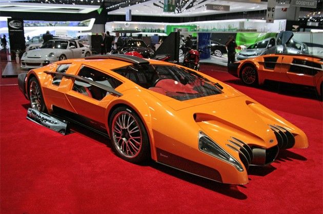 The Sbarro Autobau concept car, a striking one-off vehicle with a Ferrari V12 engine and an eye-catching orange design.