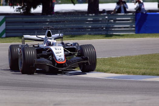 McLaren MP4-20 speeding during Indianapolis Formula 1 event.