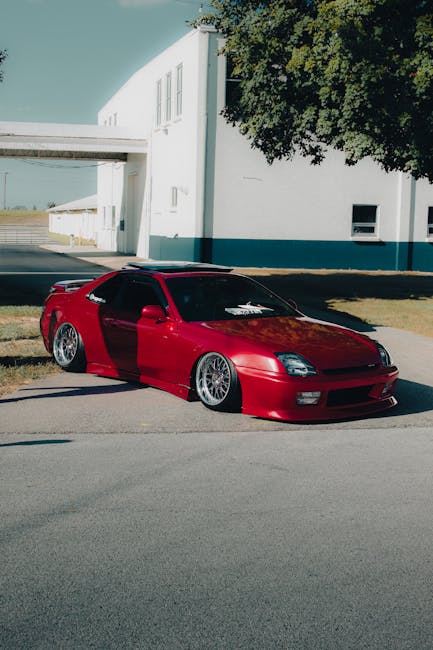 Side view of the 1998 Honda Prelude VTi-S in a parking lot