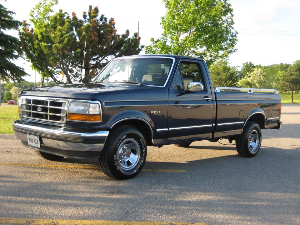 1993 Ford F-150 Classic Truck in a scenic outdoor setting showcasing its rugged design, powerful engine, and classic features.