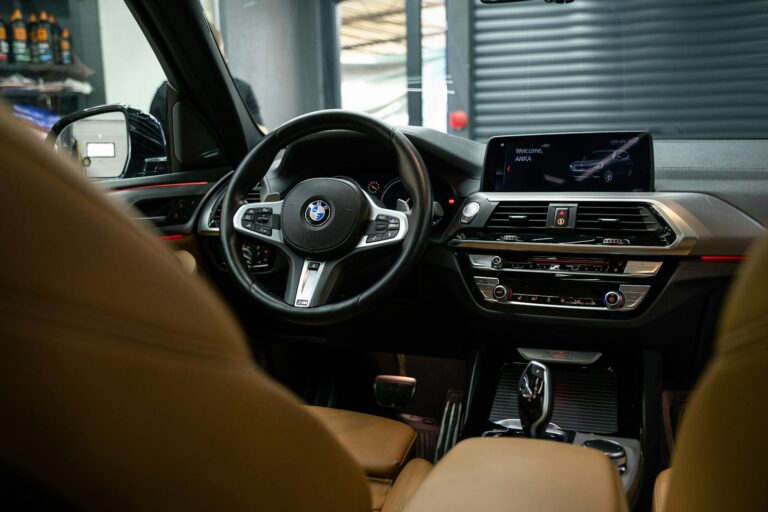Explore the sleek and modern interior of a BMW vehicle, showcasing advanced technology and comfort.