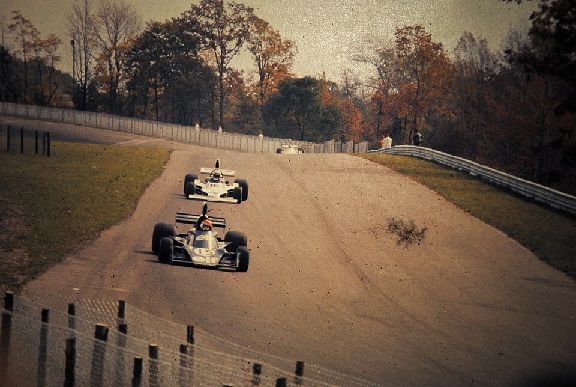Michel Leclère and Roelof Wunderink driving their Formula 1 cars at the 1975 United States Grand Prix.